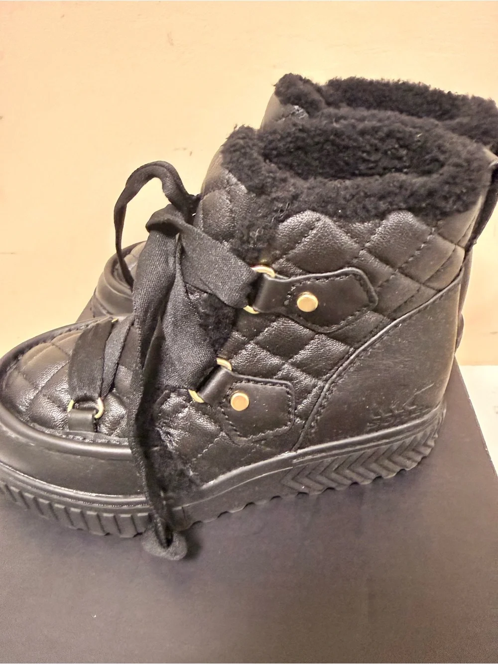 Sorel Kids Black Quilted Lace-Up Winter Boot with Faux Fur